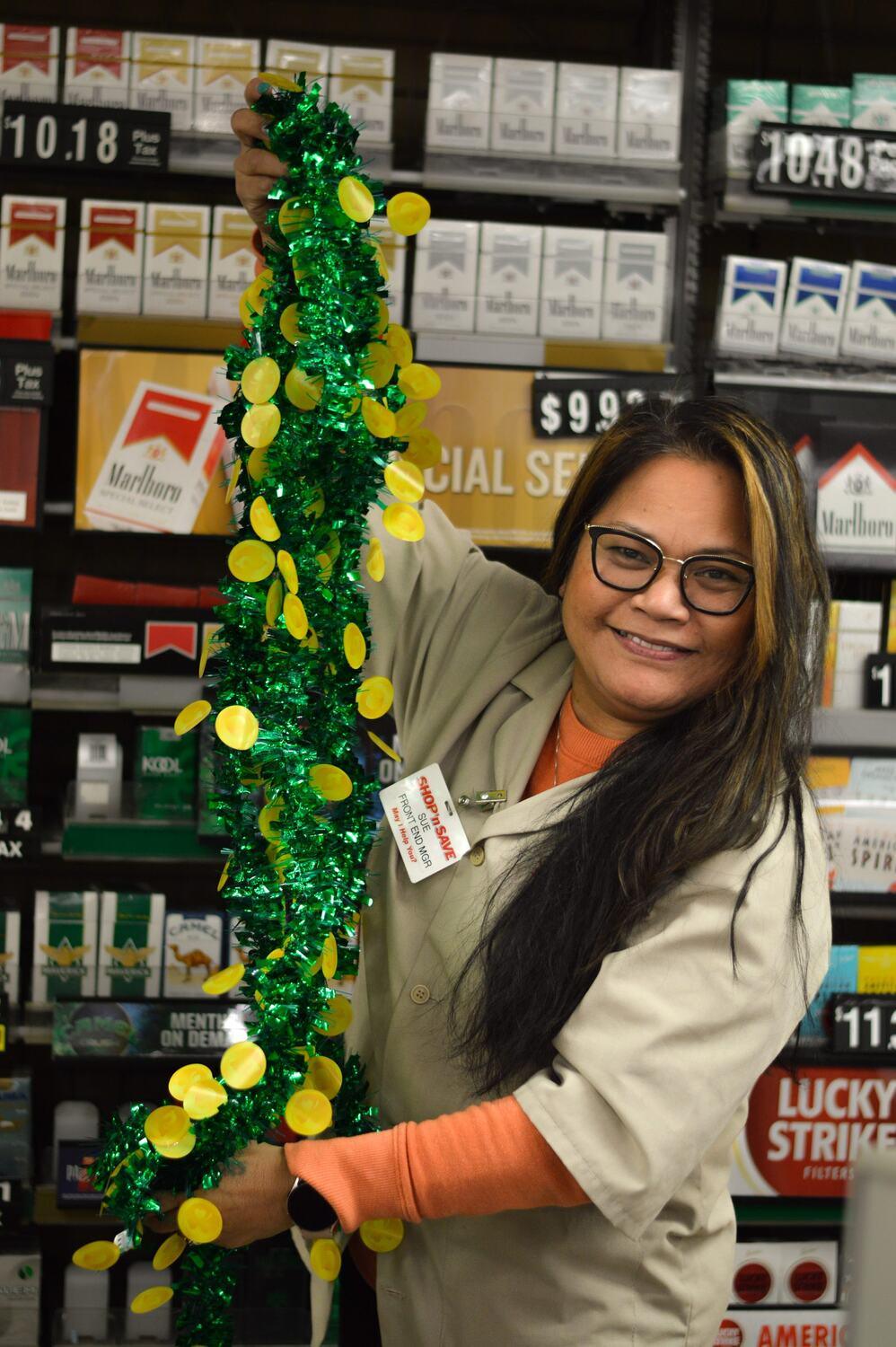 Sue from our front end, decking out the store for the holidays